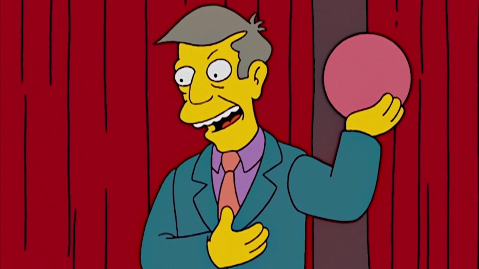 Principal Skinner from the Simpsons, holding a sphere. Probably a dodgeball.